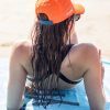 dryrobe quickdry summer cap orange female lifestyle image